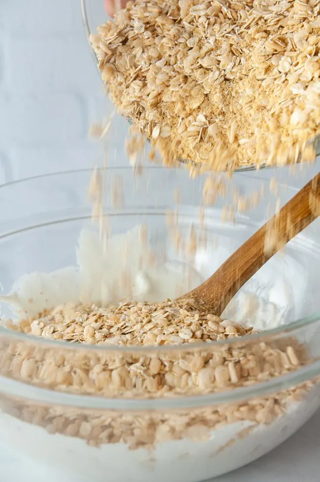 Pour the oat mixture into the melted marshmallow.