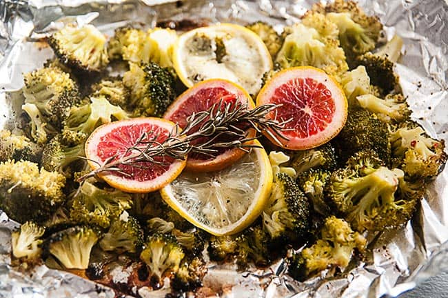 Broccoli ready to be roasted with blood oranges, lemon and rosemary