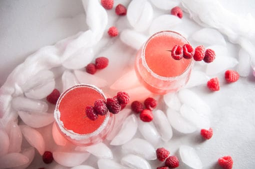 Sparkly Raspberry Champagne Cocktails - Seasoned Sprinkles
