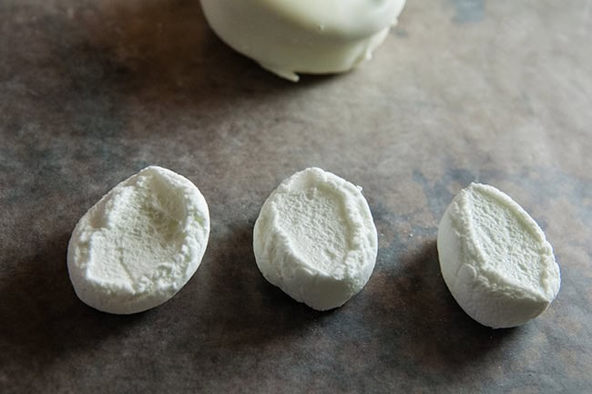 Cut the marshmallows into thirds to make bunny feet. 2 marshmallows makes feet for 3 bunny Oreos.