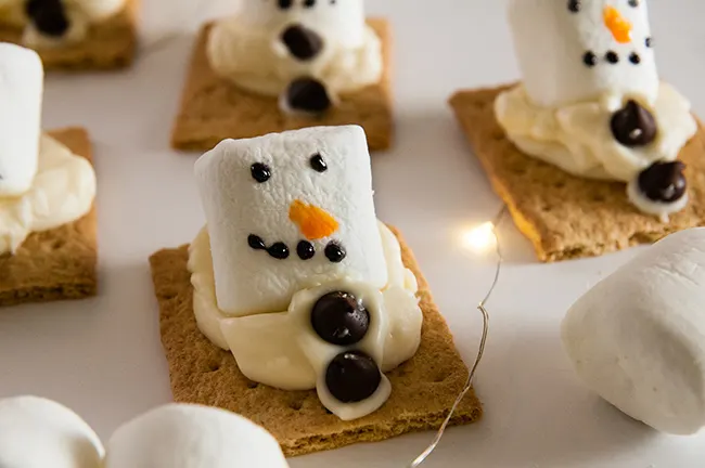 Cute little melted snowmen s'mores