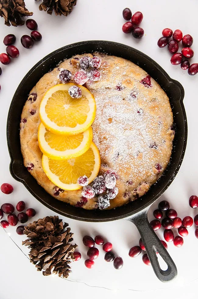 https://www.seasonedsprinkles.com/wp-content/uploads/2018/11/Cranberry-Orange-Baked-Pancake-6.jpg.webp