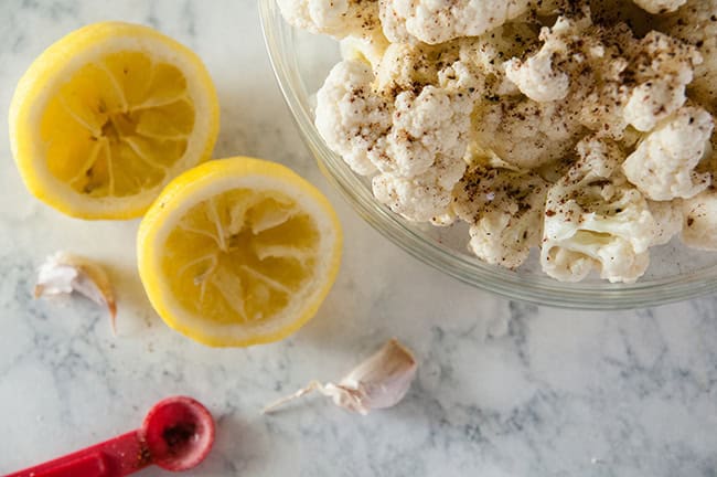 Cauliflower in a bowl with seasoning