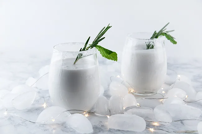 Christmas drink with coconut rum and mint. Holiday drink recipe. Christmas drink recipe.