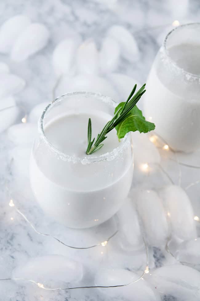 Christmas drink with coconut rum and mint