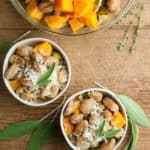 Roasted Sheet Pan Gnocchi and Fall Vegetables on wood with sage and thyme