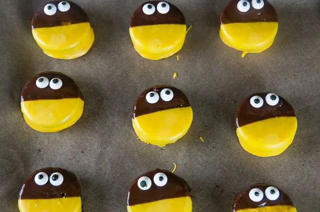 Add the eyeballs to your bumblebee cookies