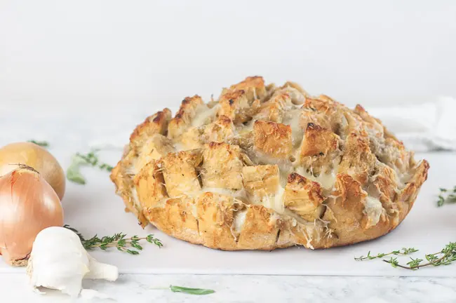 French onion bread on white with onions and herbs