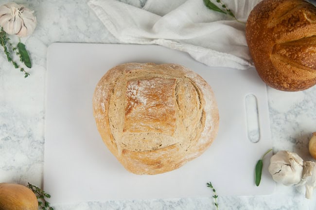 a loaf of bread on a cutting board