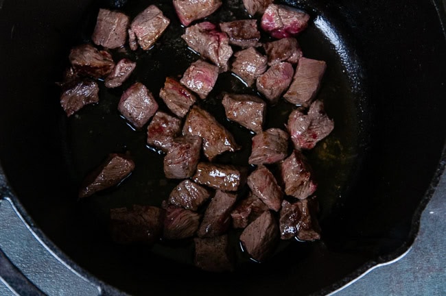 Sear the beef cubes on all sides in olive oil