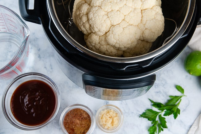 Ingredients for Barbecue Cauliflower: cauliflower, water, barbecue sauce, spices, and garlic