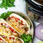 Instant Pot chicken tacos are the perfect solution for a quick, family friendly taco night.