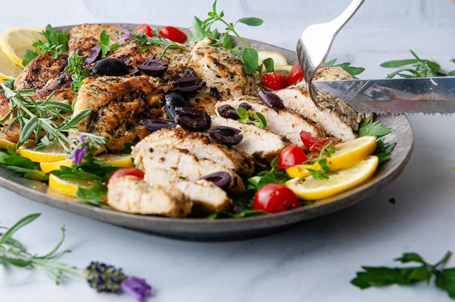 Easy Greek chicken gives you moist, tender chicken breast loaded with fresh flavor.