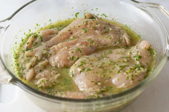 Cover the chicken in marinade