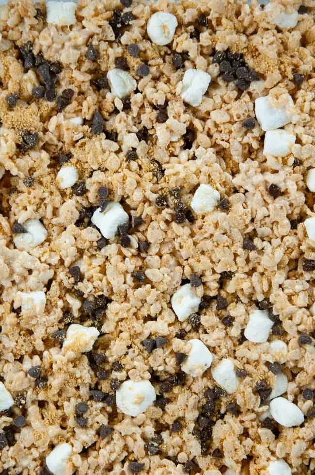 Press the s'mores Rice Krispie treat mixture into a sprayed baking dish