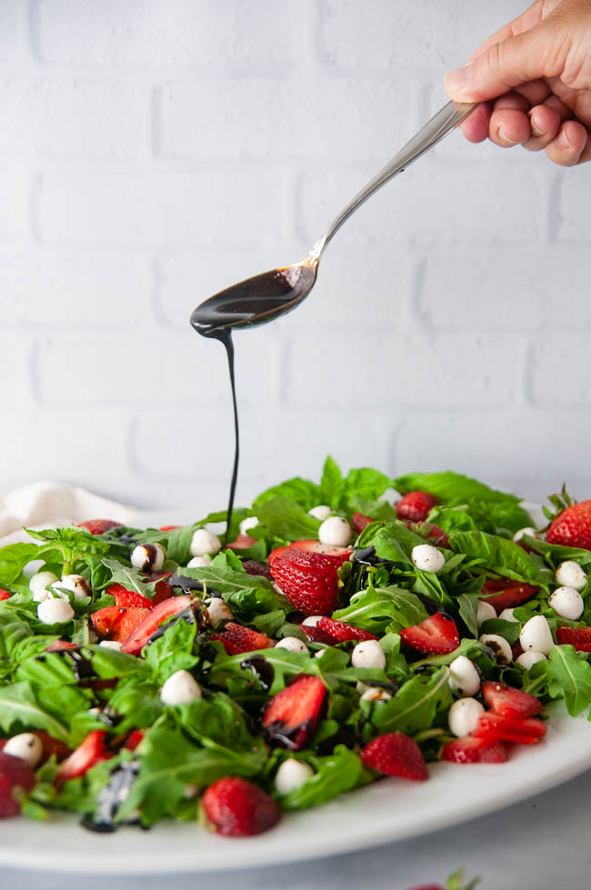 Balsamic reduction brings out all the flavors of this strawberry Caprese salad.