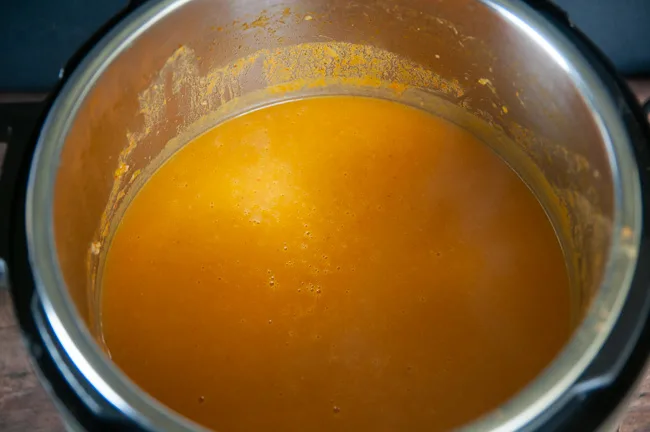 Blend the Instant Pot Curried Butternut Squash Soup with an immersion blender right in the pressure cooker.