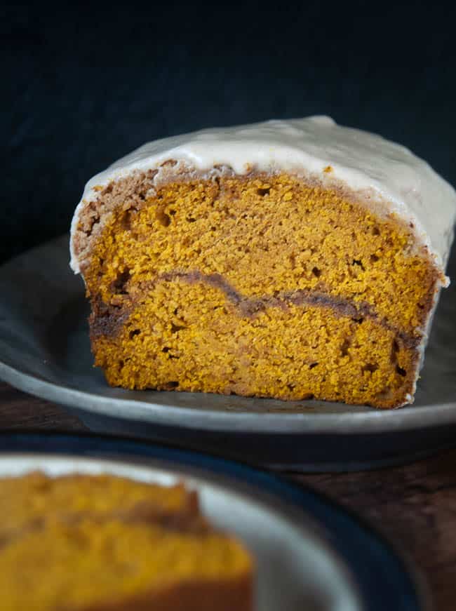 A perfect cinnamon swirl runs through pumpkin bread with streusel topping.