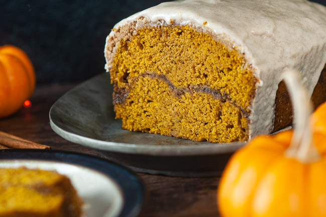 A perfect cinnamon swirl runs through pumpkin bread with streusel topping.