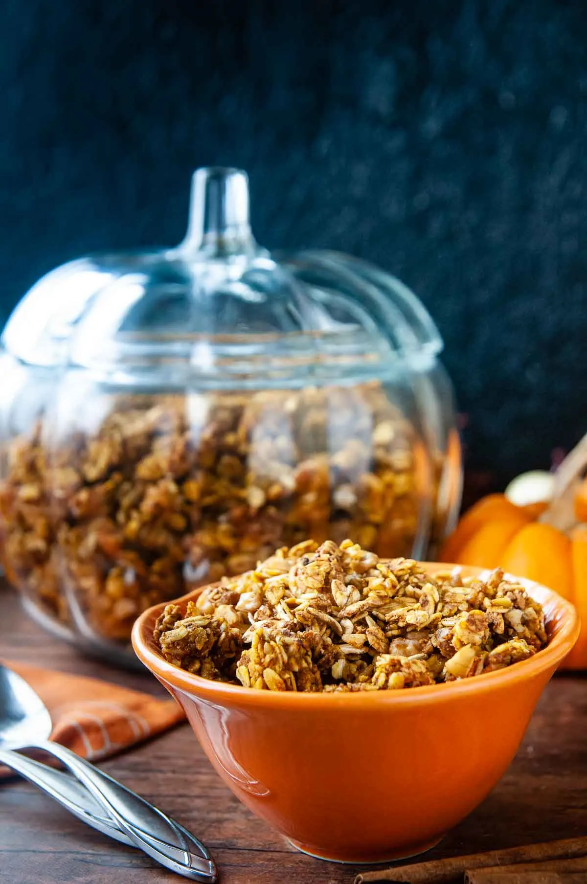 A glass pumpkin jar makes festive storage for this easy granola.