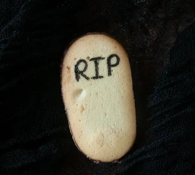 A Milano cookie with RIP written on it to look like a tombstone