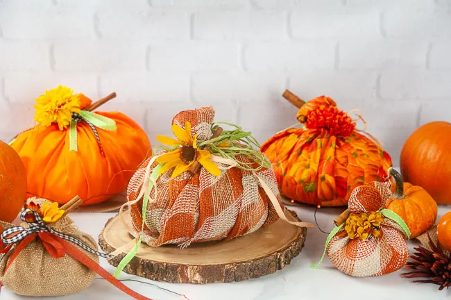 Easy No Sew Fabric Pumpkins on a white background