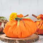 Easy No Sew Fabric Pumpkins on a white background