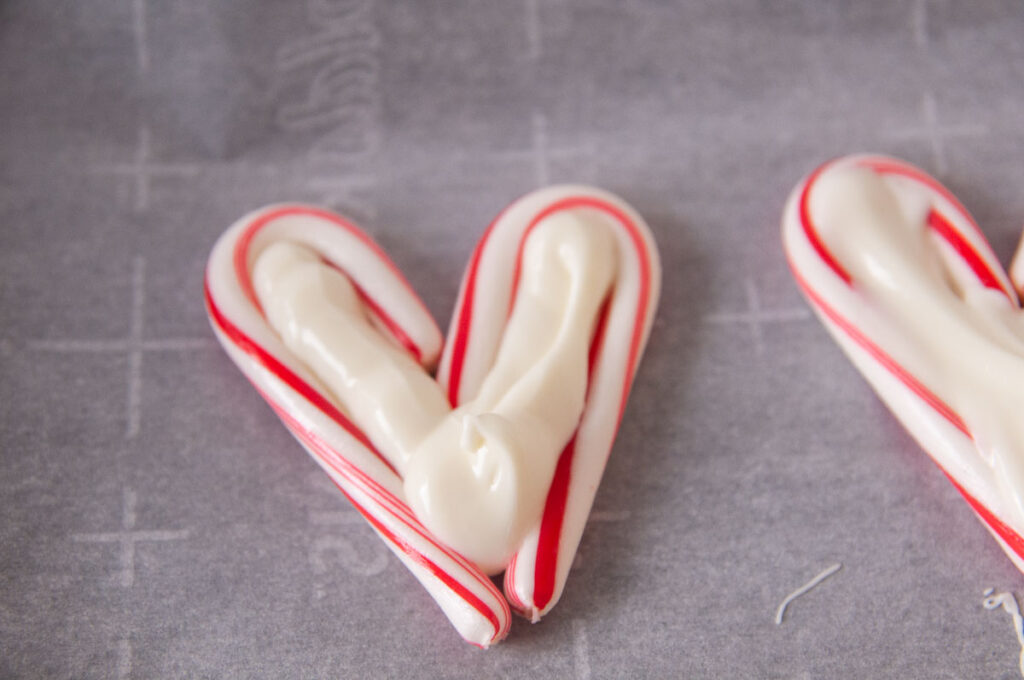 Candy cane hearts filled with melted white chocolate.