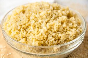 Fluffy cooked quinoa in a bowl