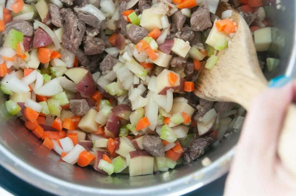 Sear the beef and then soften the veggies in the Inner liner of the Instant Pot.