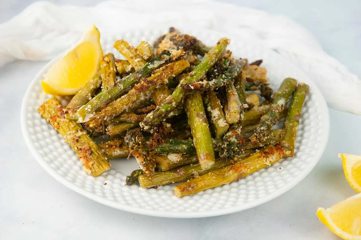 A plate of Flavor Packed Air Fryer Asparagus Tossed with the Perfect Blend of Seasonings