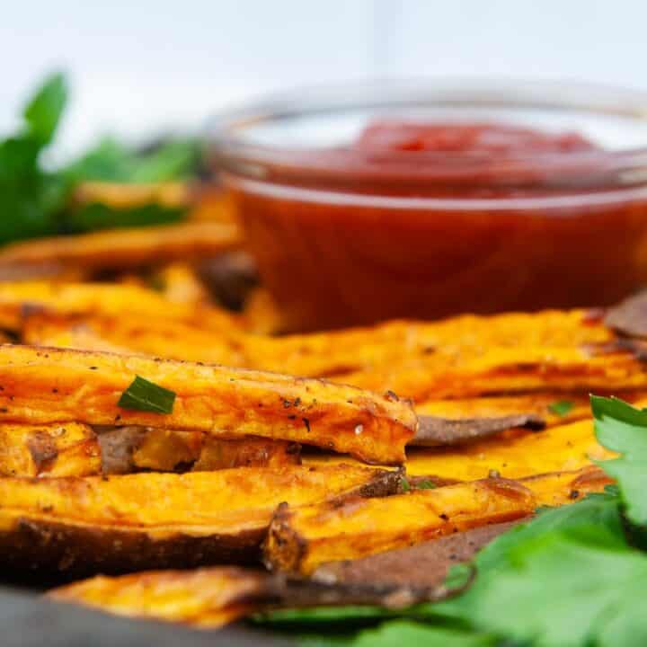 Easy air fryer sweet potatoes are the perfect thing to dunk into ketchup.