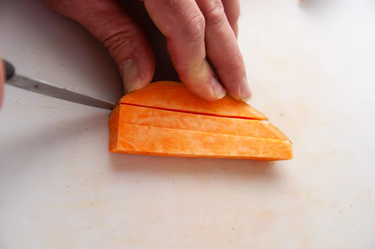 Cut the sweet potatoes into fry shapes.