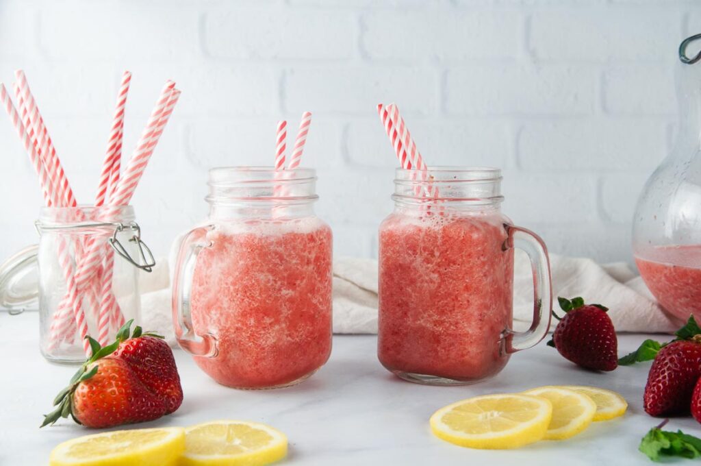 Easy Frozen Strawberry Lemonade is the perfect slushie to cool down with this summer.