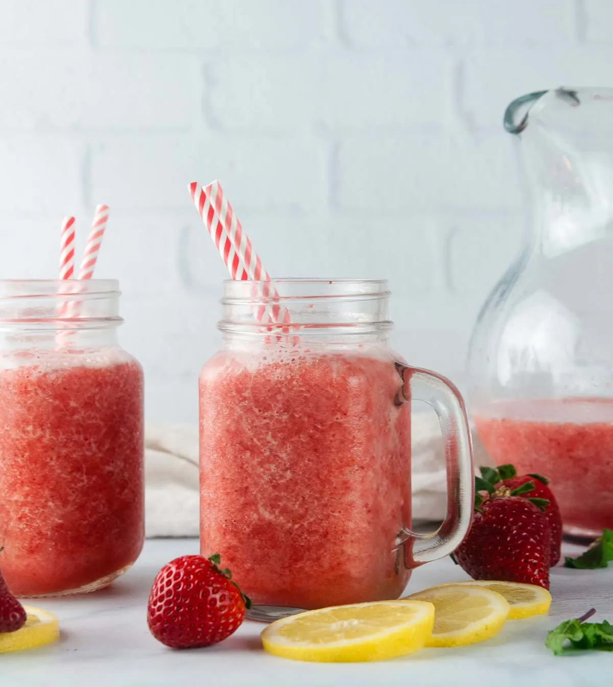 Frozen Strawberry Lemonade is the perfect slushie to cool down with this summer.