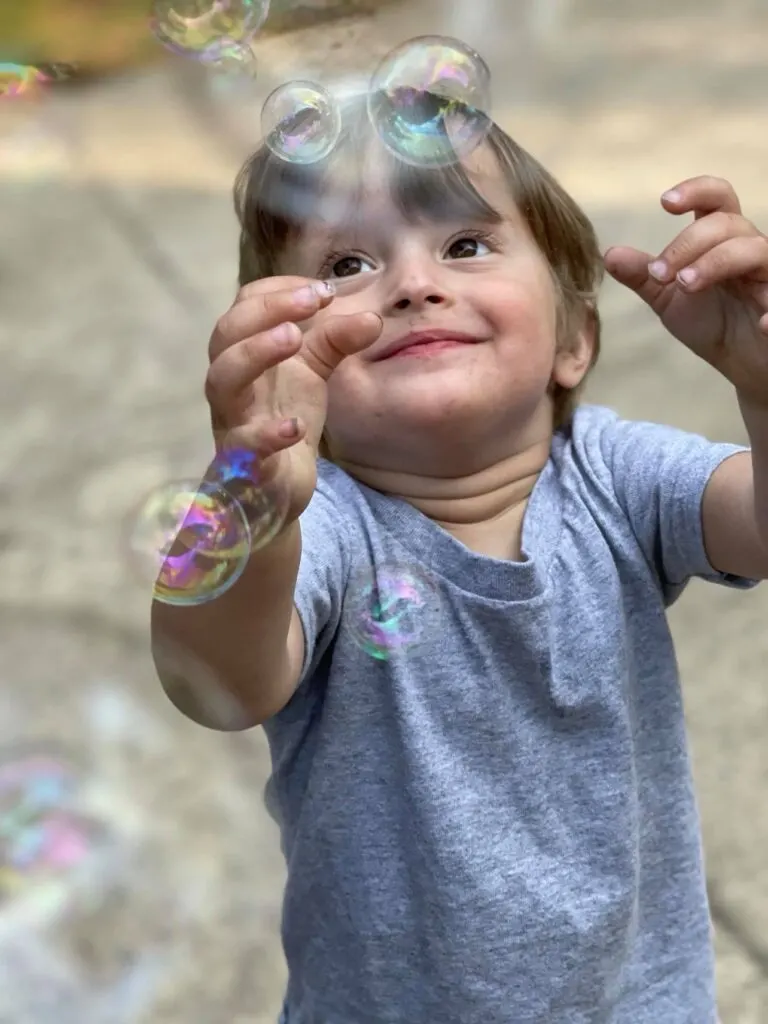 toddler boy with bubbles
