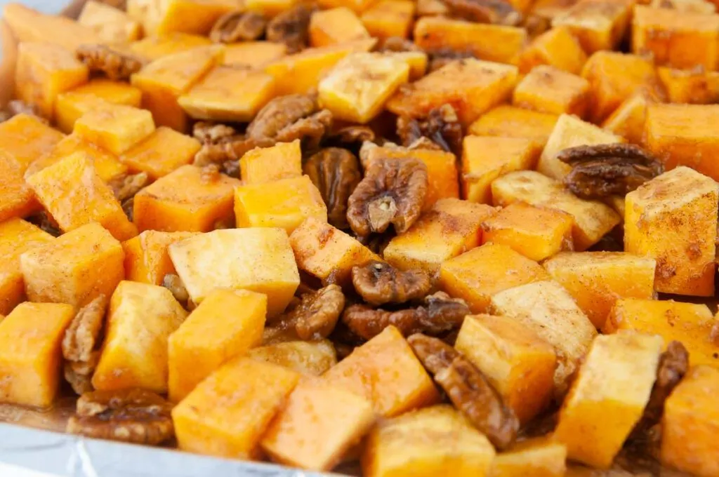 A tray of cinnamon sugar button squash ready to get roasted