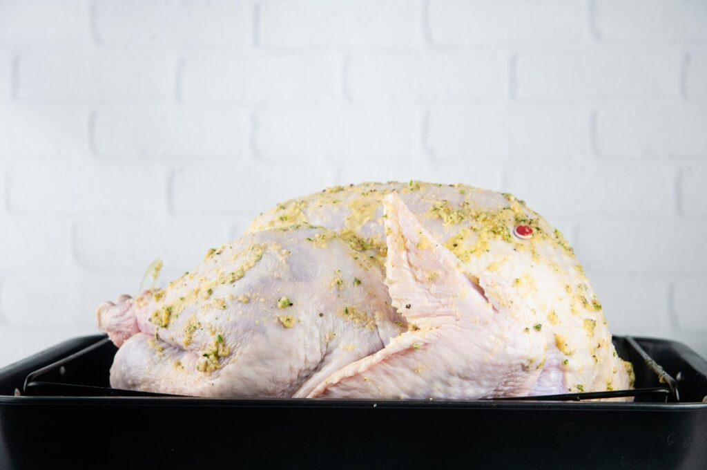 Rub the turkey with the butter baste.