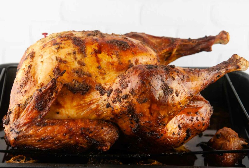 The result of basting a turkey is a juicy bird with crispy skin
