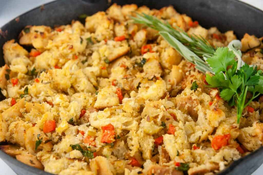 Garlic Herb Ciabatta Stuffing (Vegetarian) in a cast iron skillet makes a lovely side dish for the holidays.