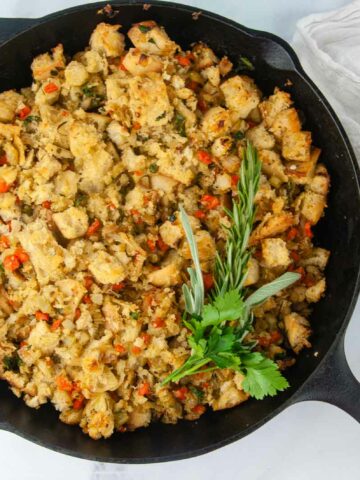 Garlic Herb Ciabatta Stuffing (Vegetarian) in a cast iron skillet makes a lovely side dish for the holidays.