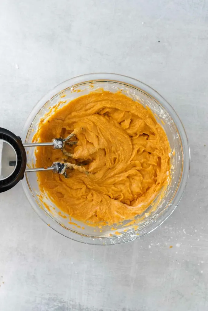 Whip the ingredients for the pumpkin cheesecake filling together