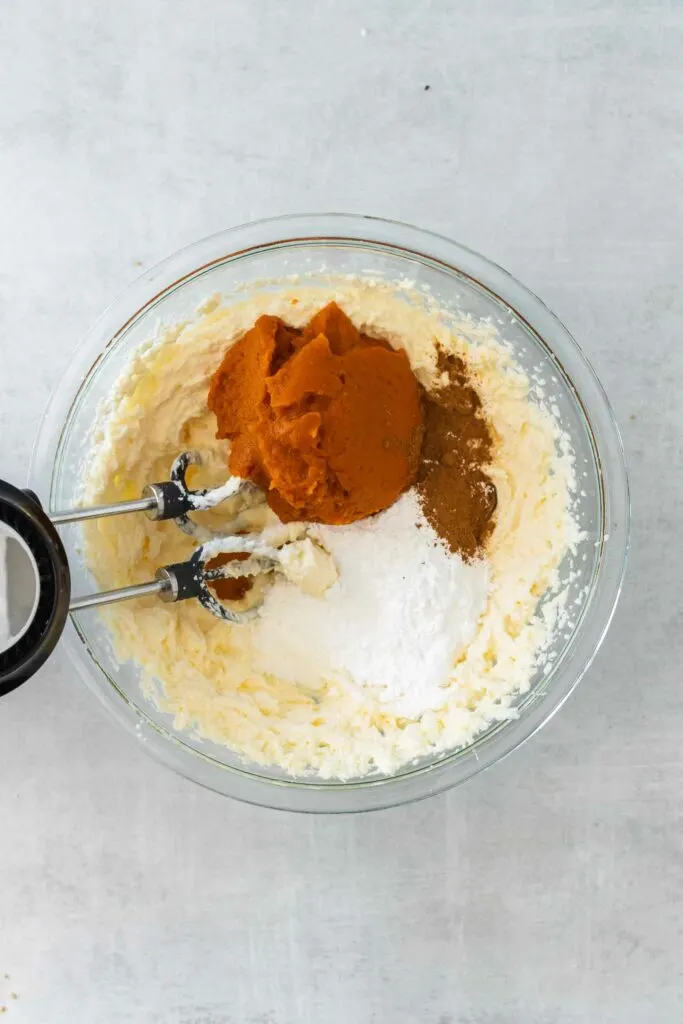 Whip the ingredients for the pumpkin cheesecake filling together