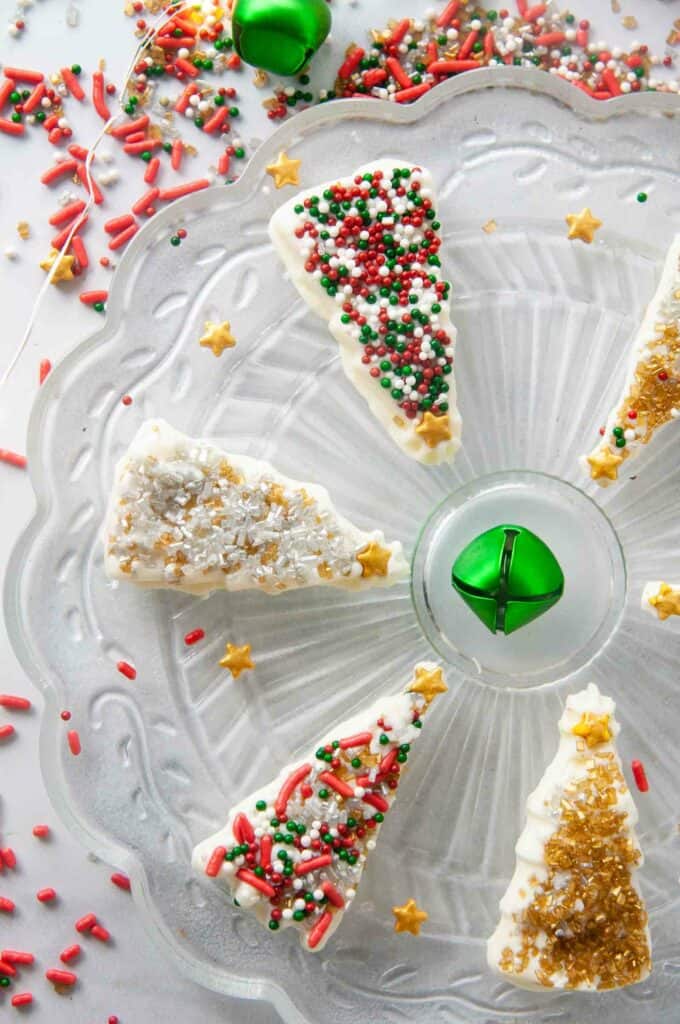 Festive sprinkles decorate homemade white chocolate Christmas trees