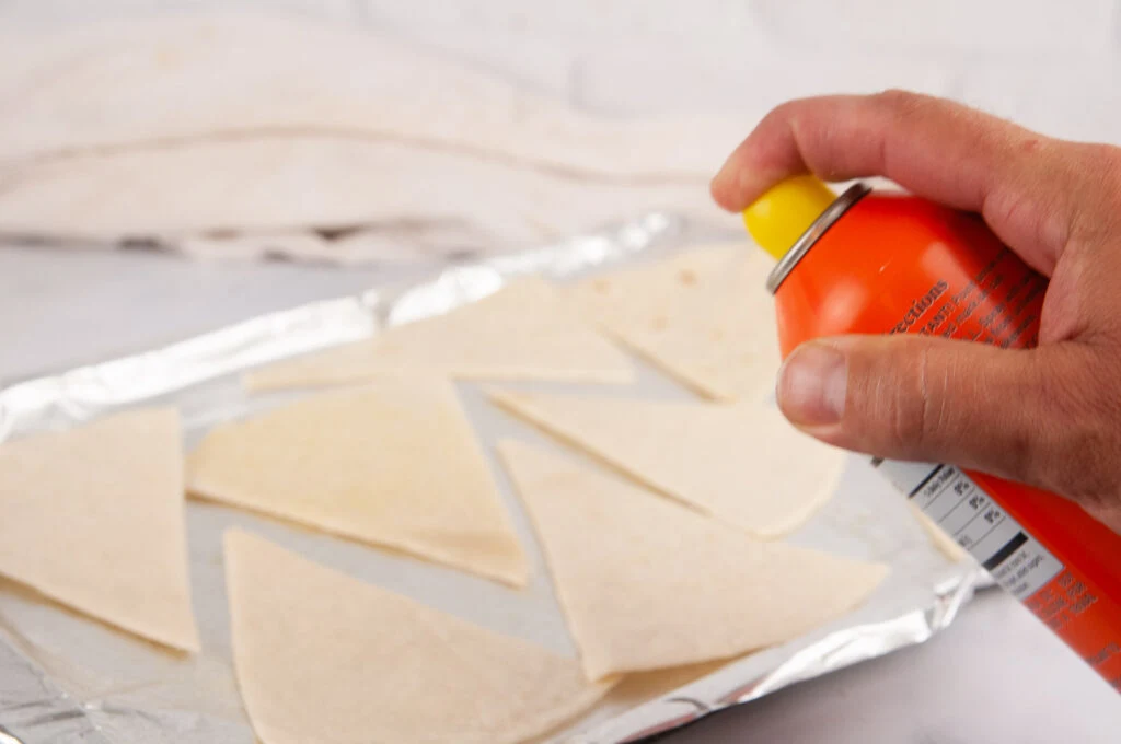 Mist the chips with nonstick spray before baking in the oven.