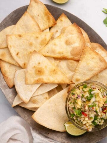 Learn how to make tortilla chips in the air fryer and the oven for a lighter way to satisfy your snack cravings.