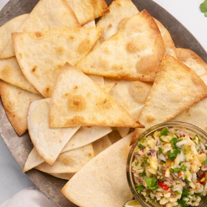 Learn how to make tortilla chips in the air fryer and the oven for a lighter way to satisfy your snack cravings.