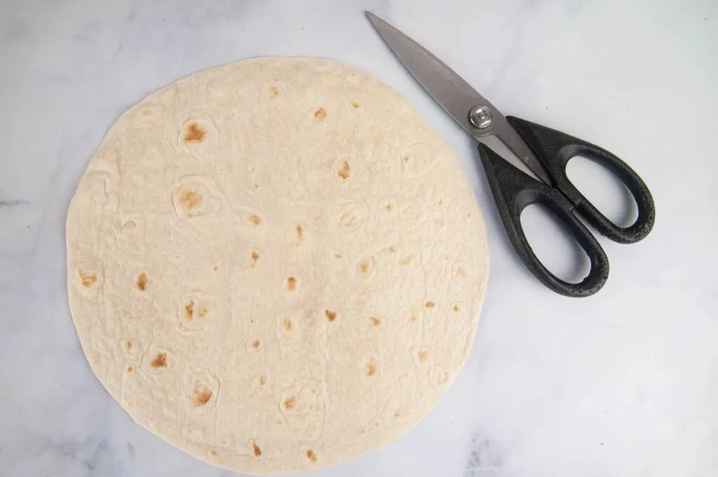 Use kitchen sheers to easily cut tortilla chips.