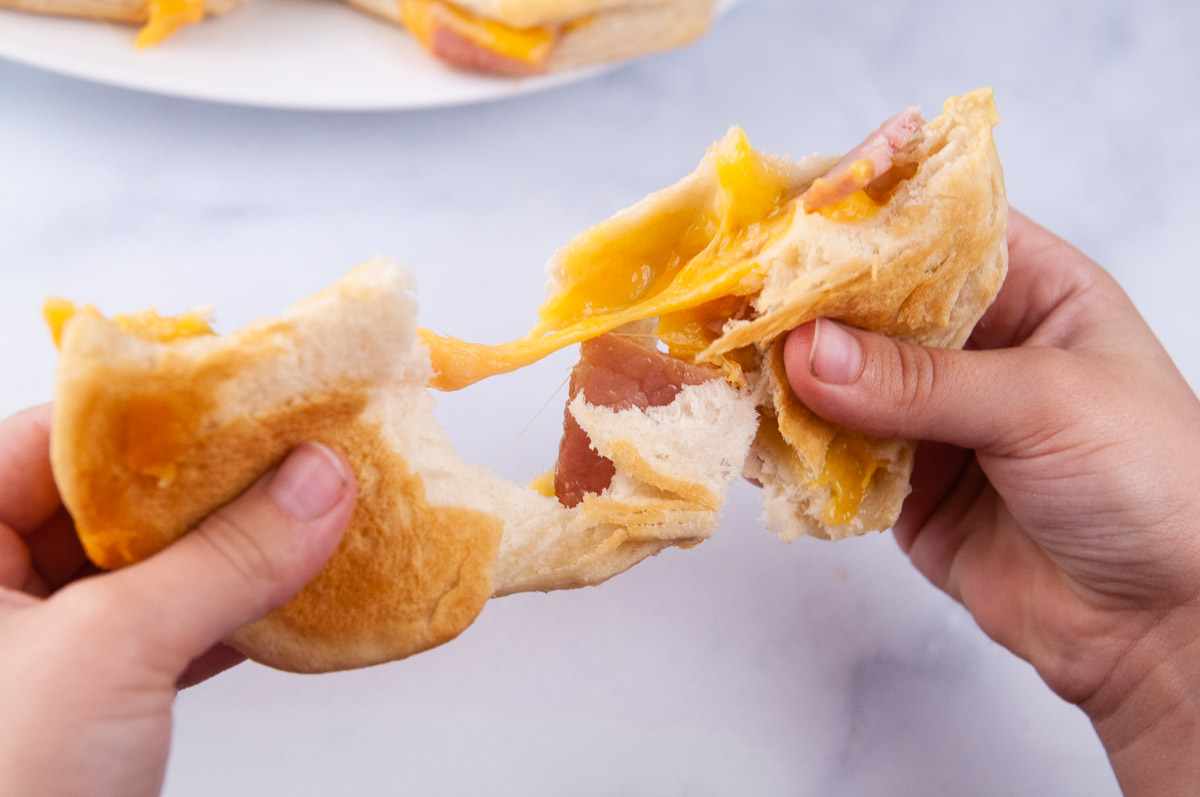 Loaded with melted cheddar, ham and cheese biscuits are a kid friendly way to use up holiday hams.