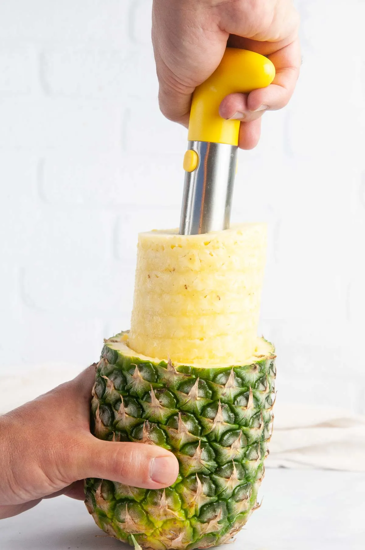 A pineapple corer helps making pineapple salsa easy